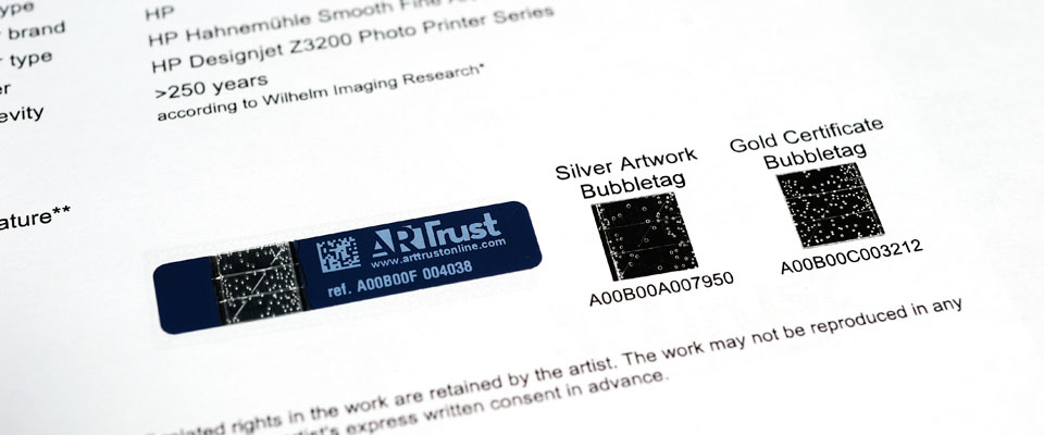 The images of the linked ArtTrust tag set are printed on the certificates so that even if the online database of ArtTrust is not running, the artwork will still be able to be authenticated by physical comparisons using the certificates.