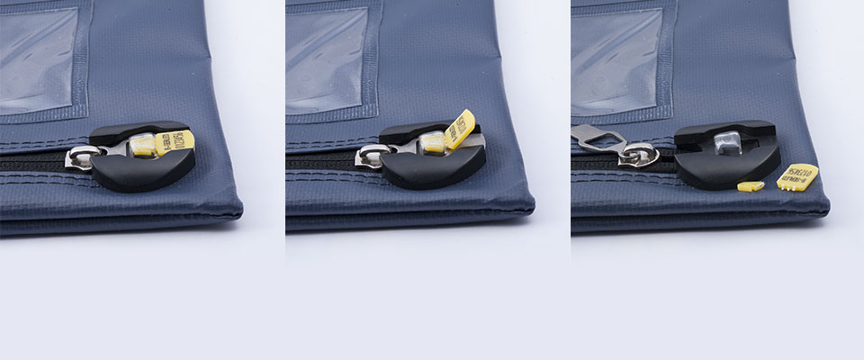Removal of the ZipLock seal is easy - snap the tag off, and the zipper puller comes free. Remove the locking arrow from the chamber and discard.